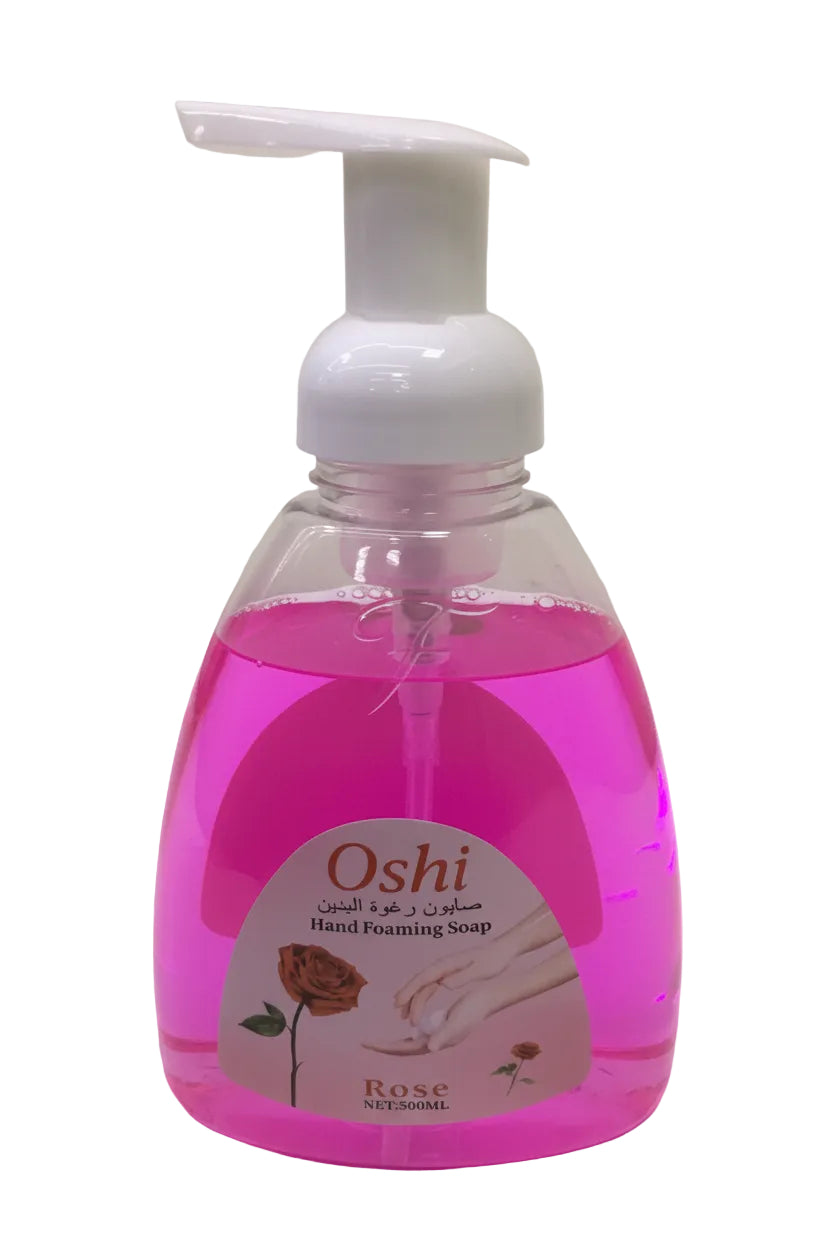 Hand soap bottle with a pink cap on a white background