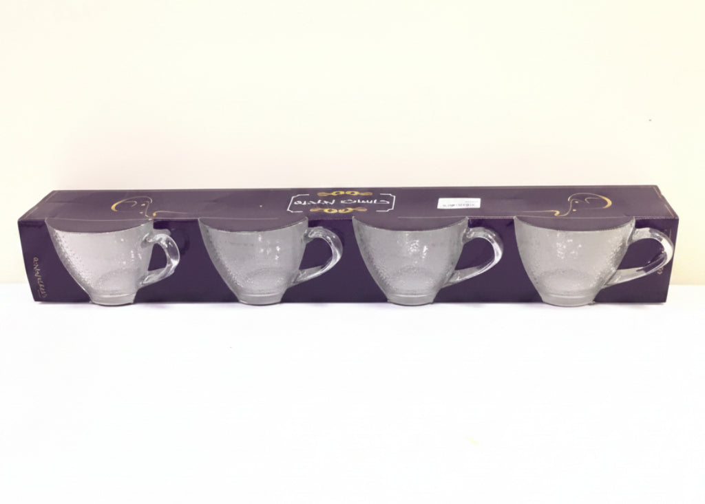 Packaging of clear glass teapots on a white background