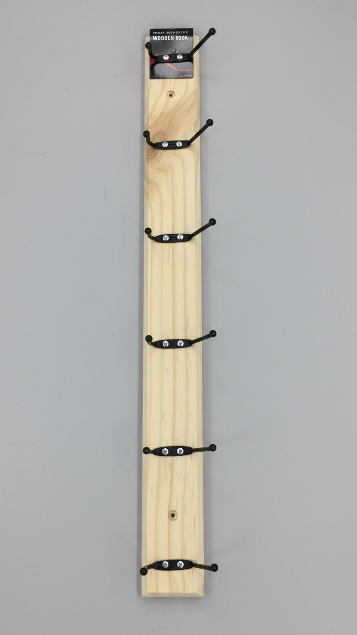 Wooden pegboard with hooks on a white background