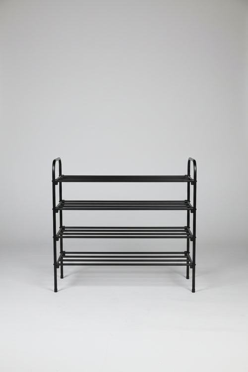 Metallic magazine rack on a white background