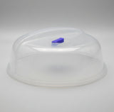 Clear plastic lid with a blue label on a white surface