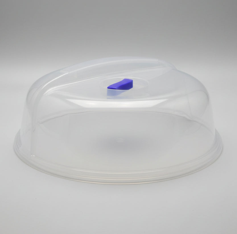 Clear plastic lid with a blue label on a white surface