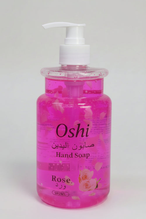 Hand soap bottle with rose fragrance on a white background