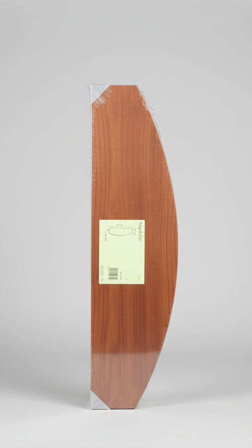 Wooden paddle with a label on a counter in a store setting
